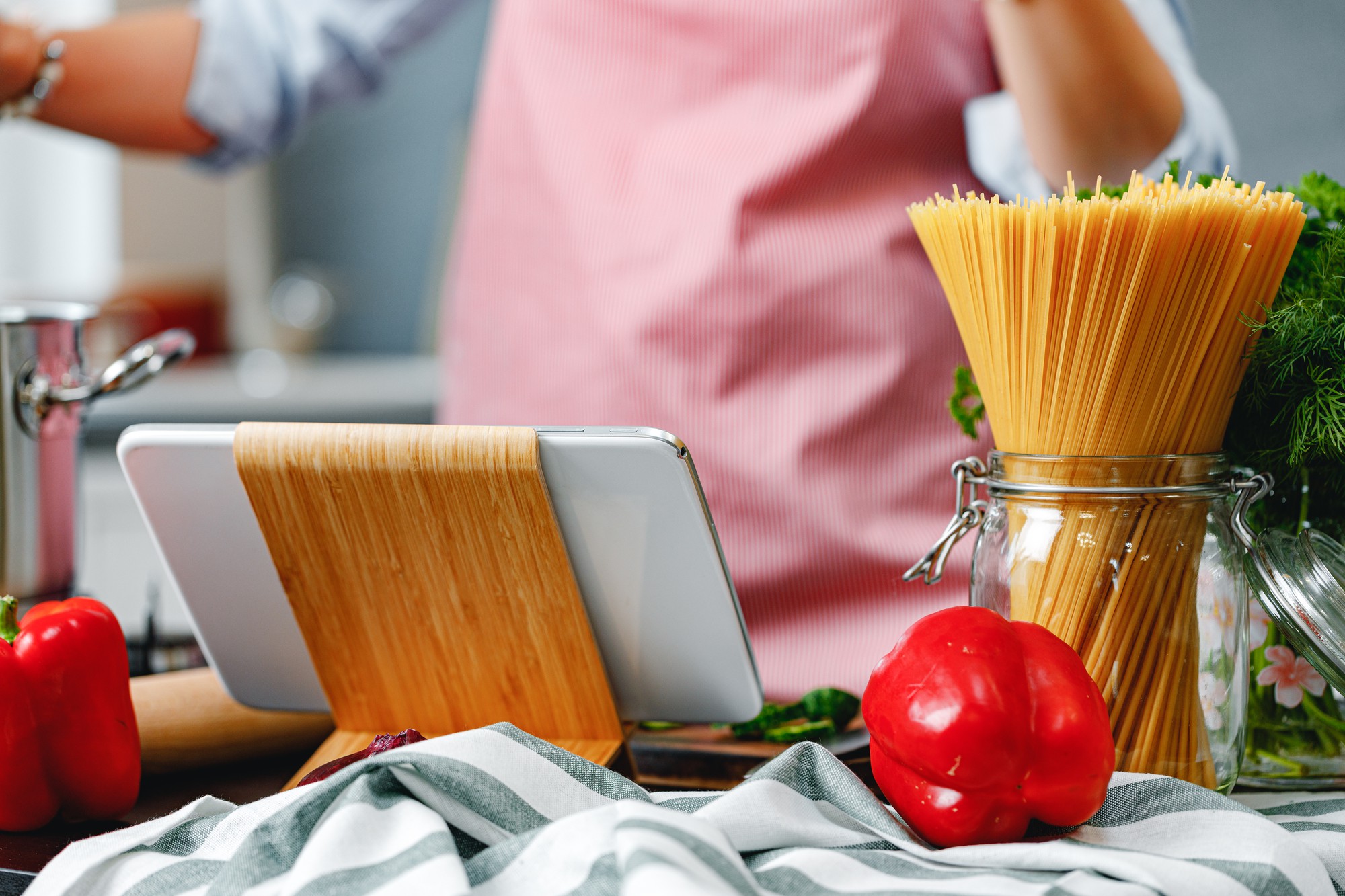 Kitchen workstation with laptop and ingredients